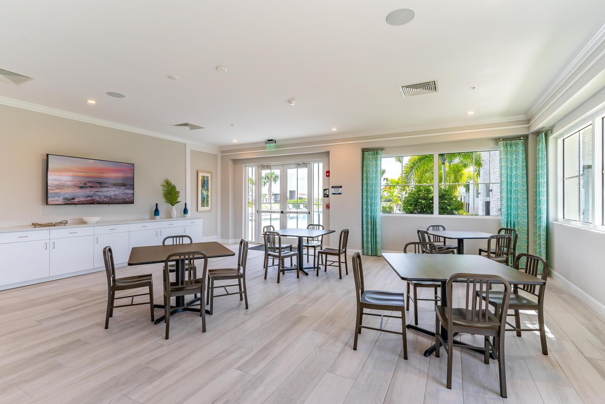 4164 Rosa Drive Deerfield Beach, FL 33064 - Photo 45 of 50 a dining room with furniture window and wooden floor