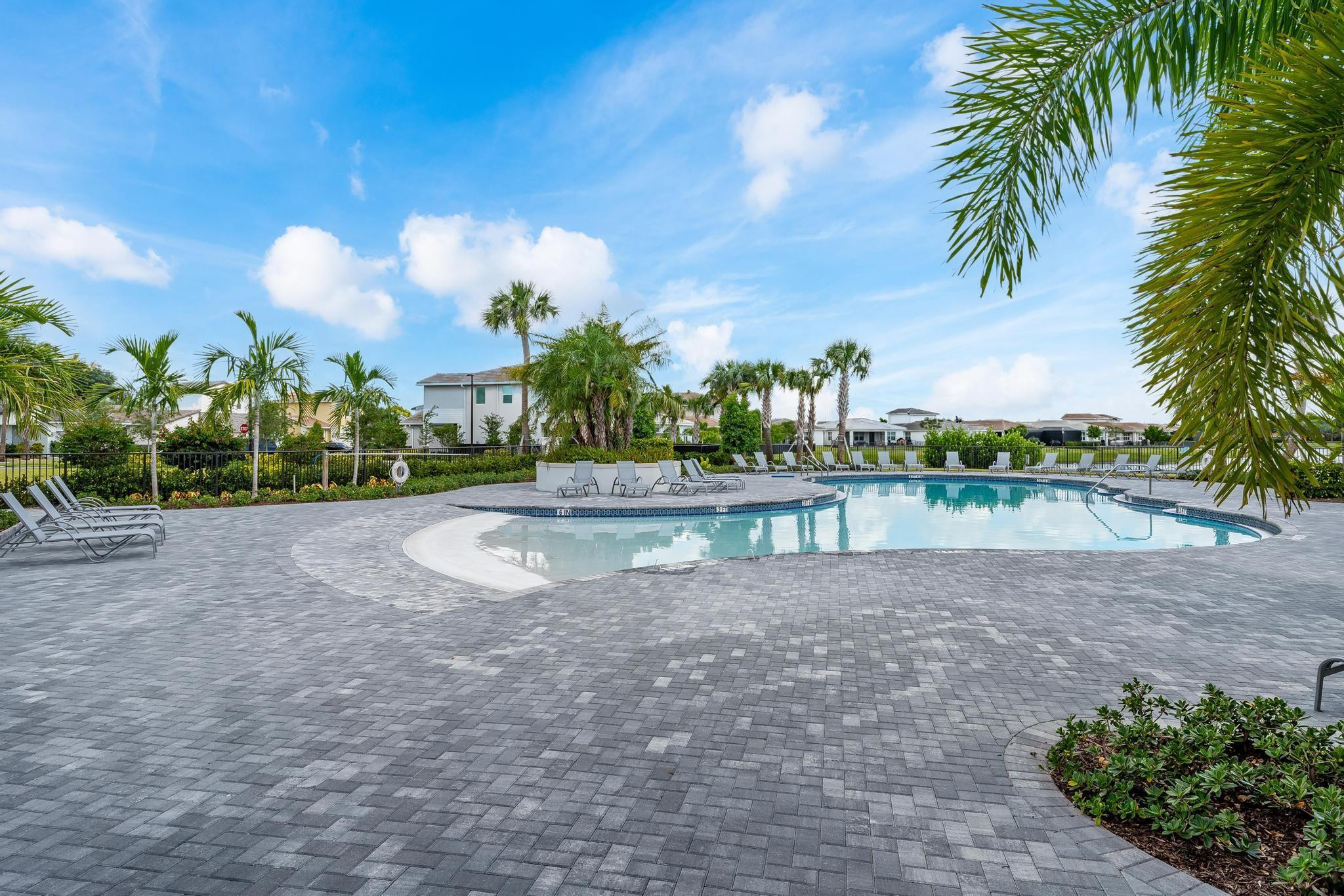4164 Rosa Drive Deerfield Beach, FL 33064 - Photo 48 of 50 a view of a garden