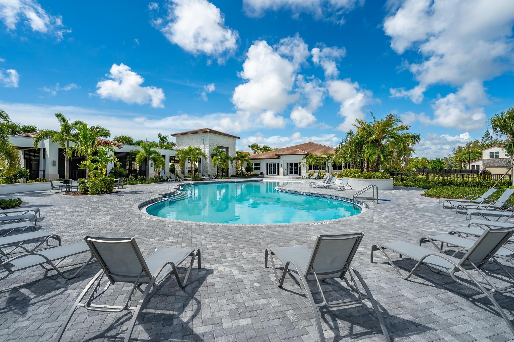 4164 Rosa Drive Deerfield Beach, FL 33064 - Photo 49 of 50 a view of a backyard with sitting area