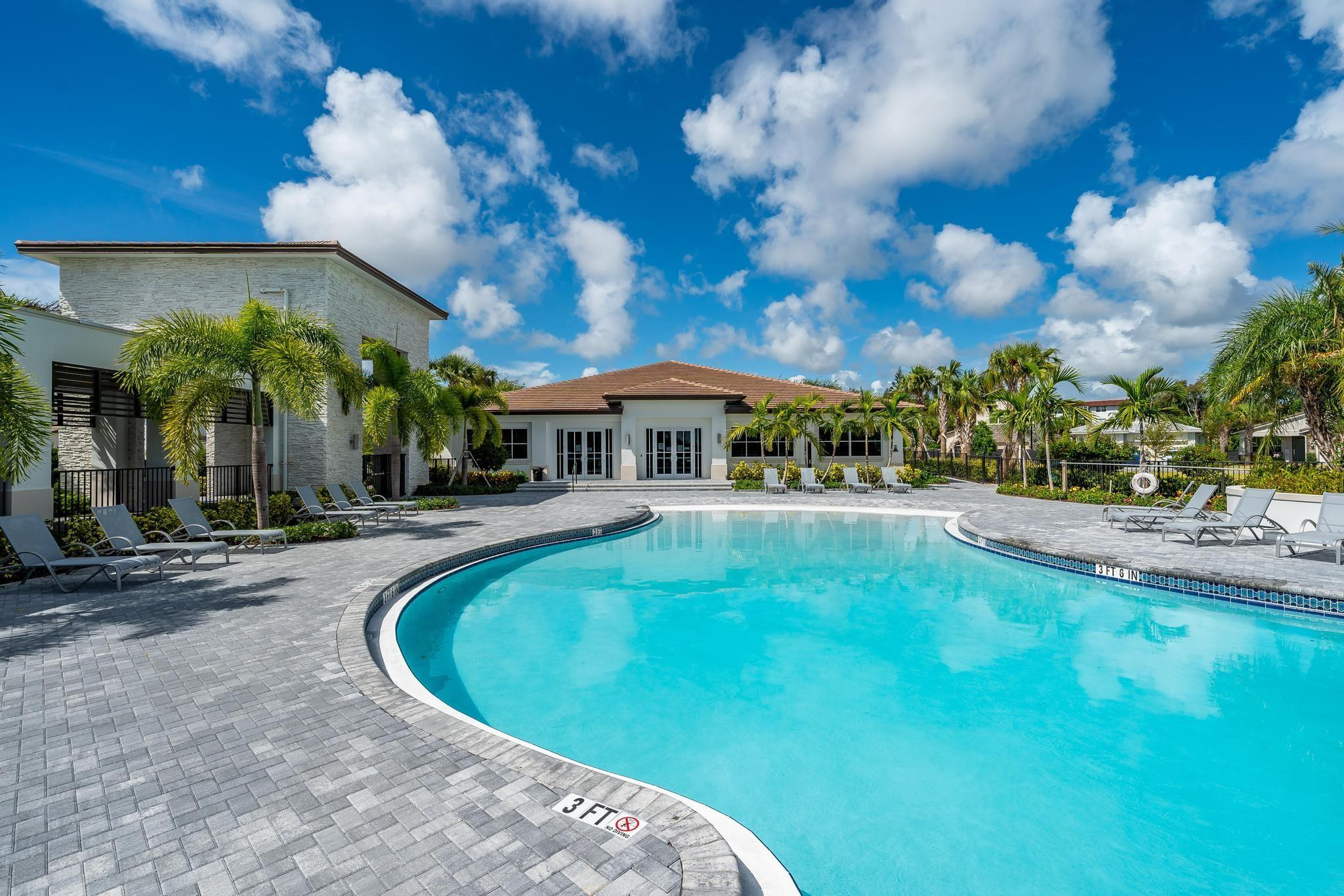 4164 Rosa Drive Deerfield Beach, FL 33064 - Photo 50 of 50 a view of a house with swimming pool and sitting area