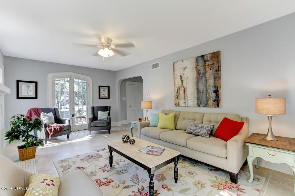 2241 Bayview Road Jacksonville, FL 32210 - Photo 11 of 55 a living room with furniture potted plant and window