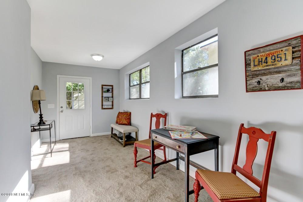 2241 Bayview Road Jacksonville, FL 32210 - Photo 13 of 55 a living room with furniture and a window