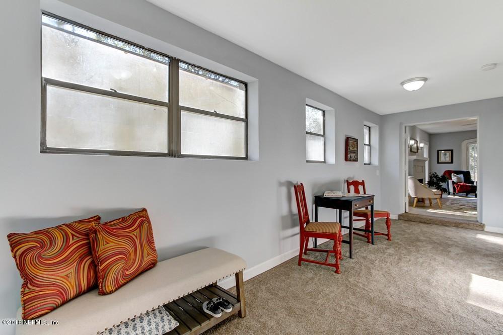2241 Bayview Road Jacksonville, FL 32210 - Photo 14 of 55 a living room with furniture and a window