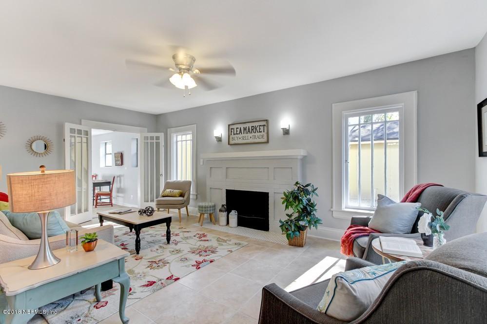 2241 Bayview Road Jacksonville, FL 32210 - Photo 20 of 55 a living room with furniture and a fireplace