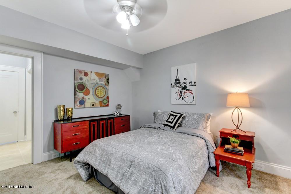 2241 Bayview Road Jacksonville, FL 32210 - Photo 21 of 55 a bedroom with a bed and dresser