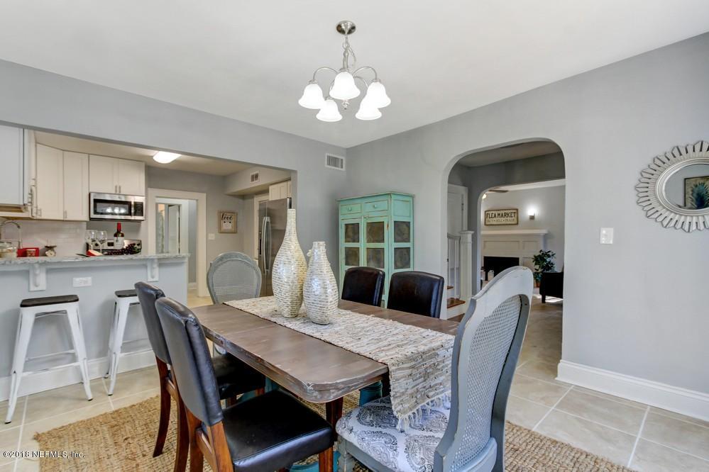 2241 Bayview Road Jacksonville, FL 32210 - Photo 36 of 55 a view of a dining room with furniture and wooden floor