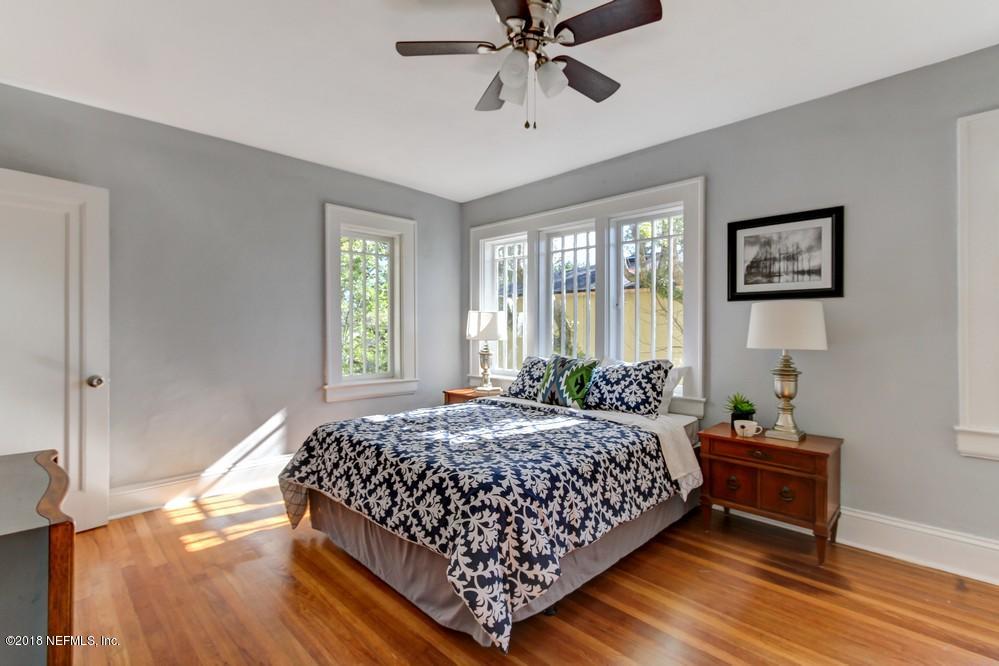 2241 Bayview Road Jacksonville, FL 32210 - Photo 38 of 55 a bedroom with a bed and a window
