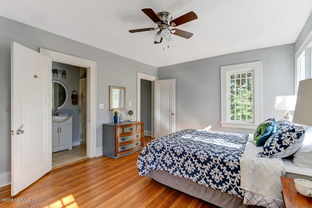 2241 Bayview Road Jacksonville, FL 32210 - Photo 39 of 55 a bedroom with a bed and a dresser