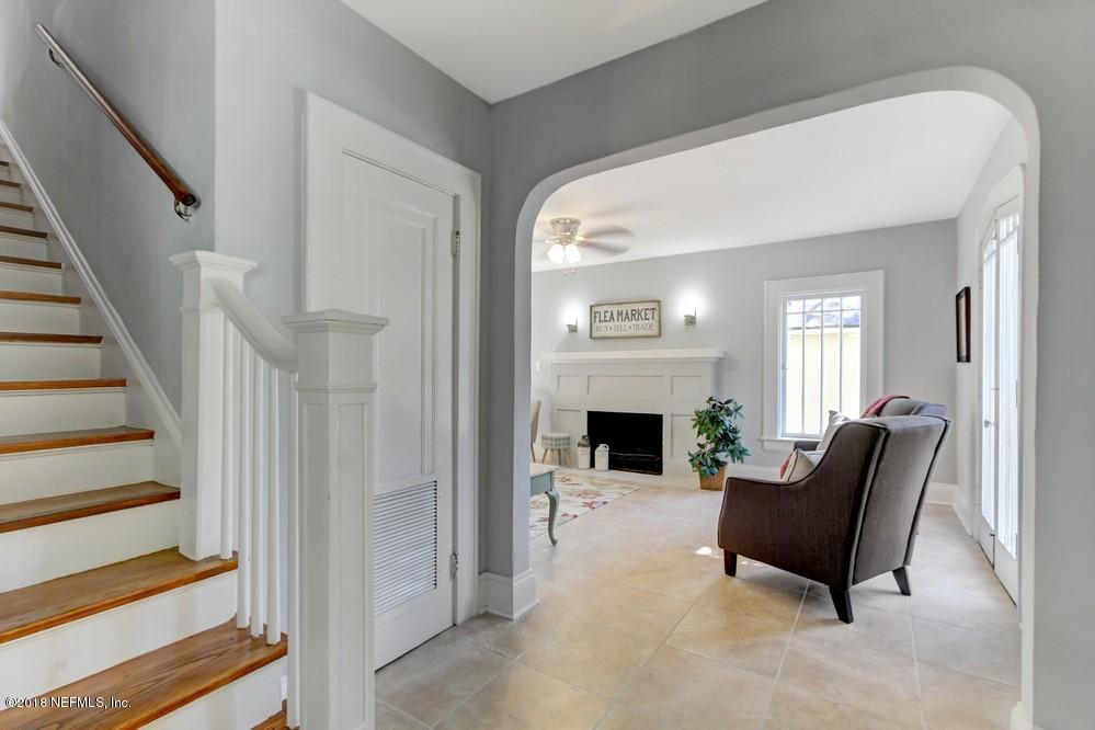 2241 Bayview Road Jacksonville, FL 32210 - Photo 5 of 55 a living room with furniture and a fireplace