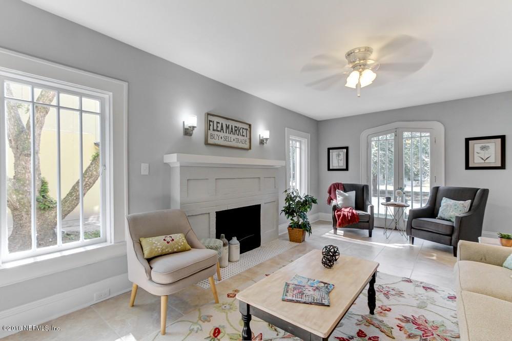 2241 Bayview Road Jacksonville, FL 32210 - Photo 10 of 55 a living room with furniture and a fireplace