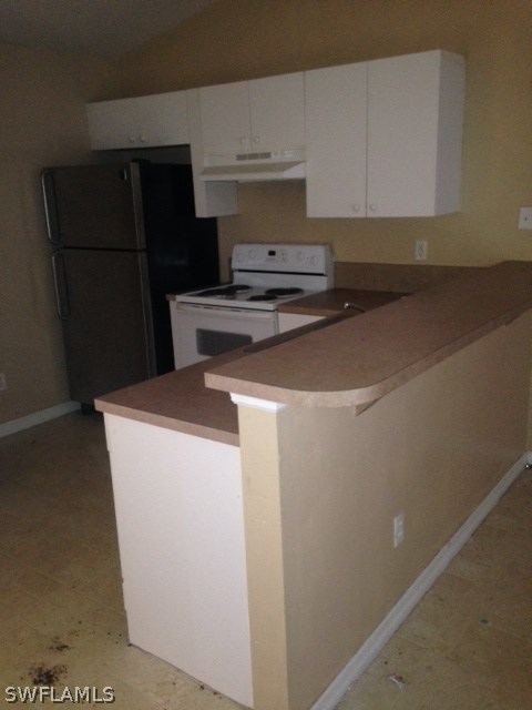 554 Alabama Road South Lehigh Acres, FL 33974 - Photo 5 of 7 a utility room with dryer and washer