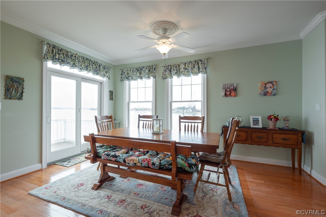 580 Riverside Drive Lancaster, VA 22503 - Photo 17 of 50 a dining room with furniture and window