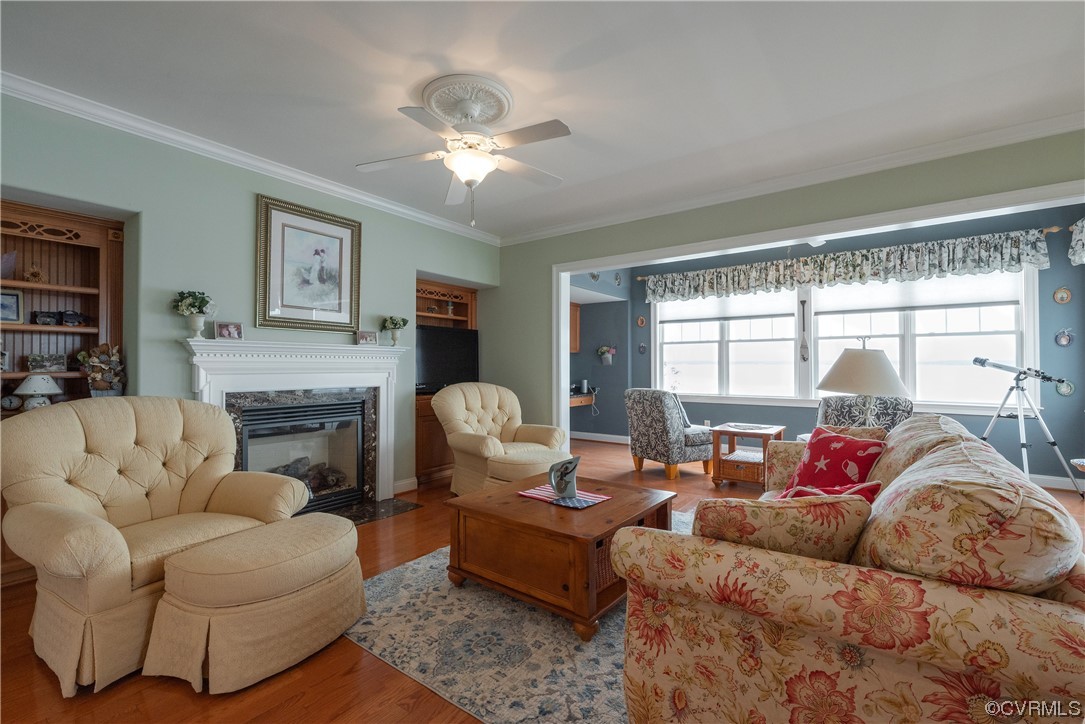 580 Riverside Drive Lancaster, VA 22503 - Photo 18 of 50 a living room with furniture and a large window