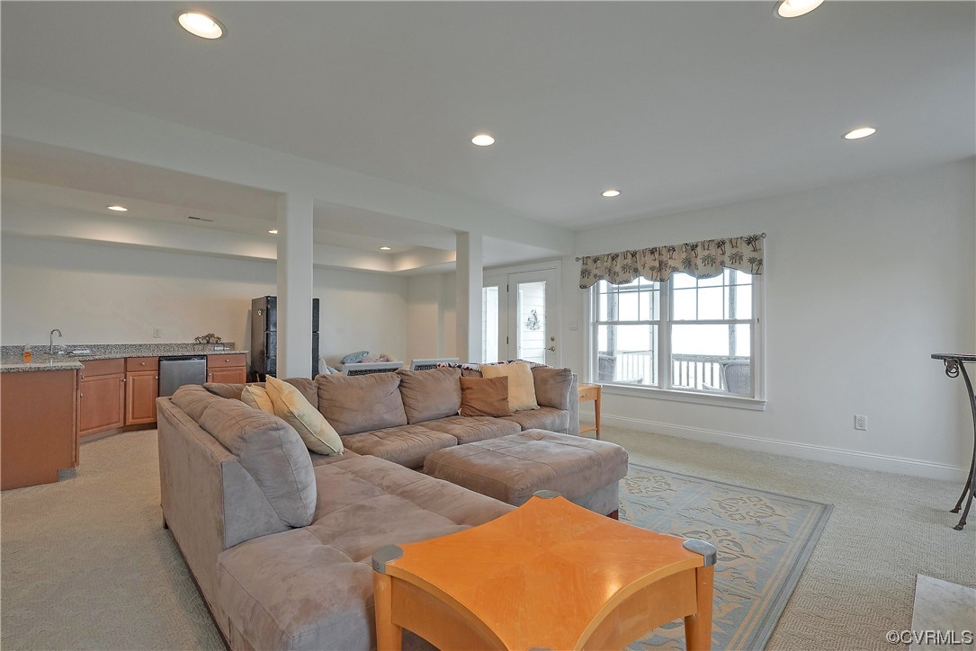 580 Riverside Drive Lancaster, VA 22503 - Photo 30 of 50 a living room with furniture and a window