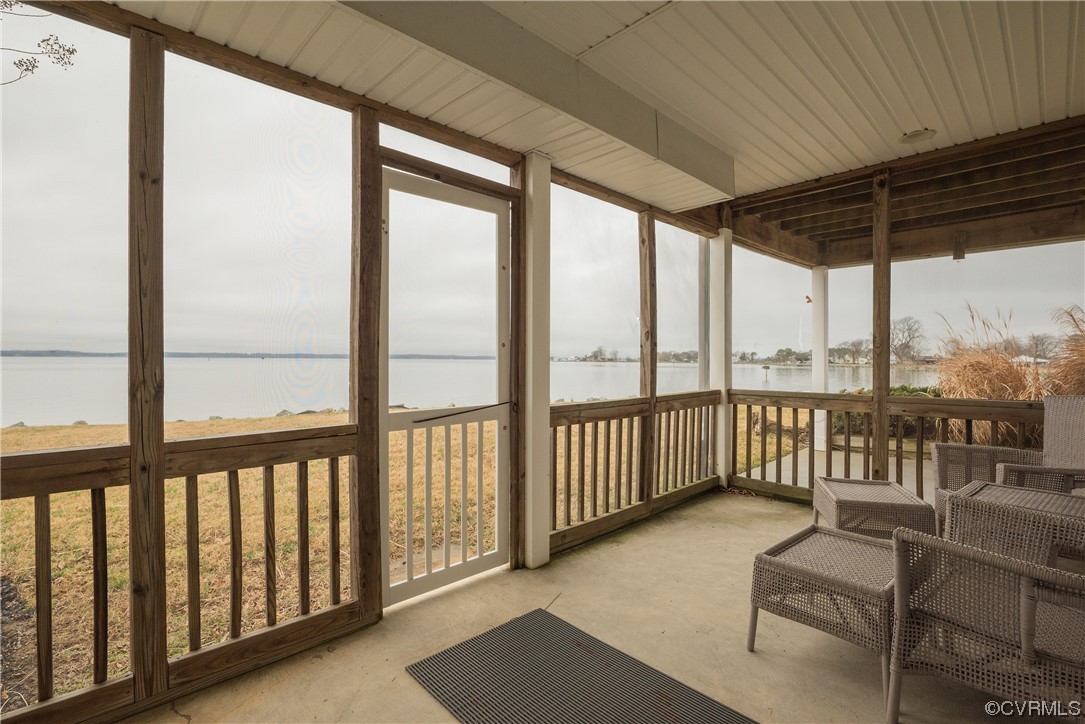 580 Riverside Drive Lancaster, VA 22503 - Photo 31 of 50 a view of a porch with furniture