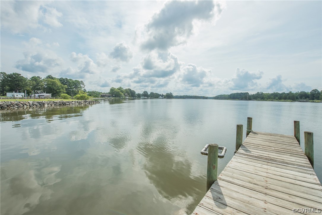 580 Riverside Drive Lancaster, VA 22503 - Photo 4 of 50 a view of a lake with houses