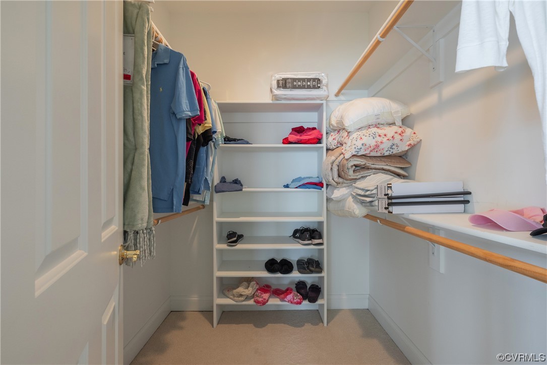 580 Riverside Drive Lancaster, VA 22503 - Photo 41 of 50 a view of walk in closet with clothes and shoes