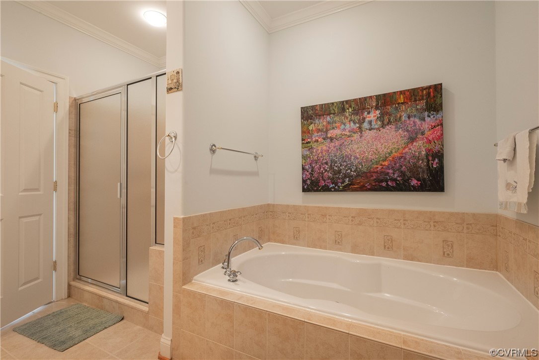 580 Riverside Drive Lancaster, VA 22503 - Photo 43 of 50 a bathroom with a bathtub and a shower