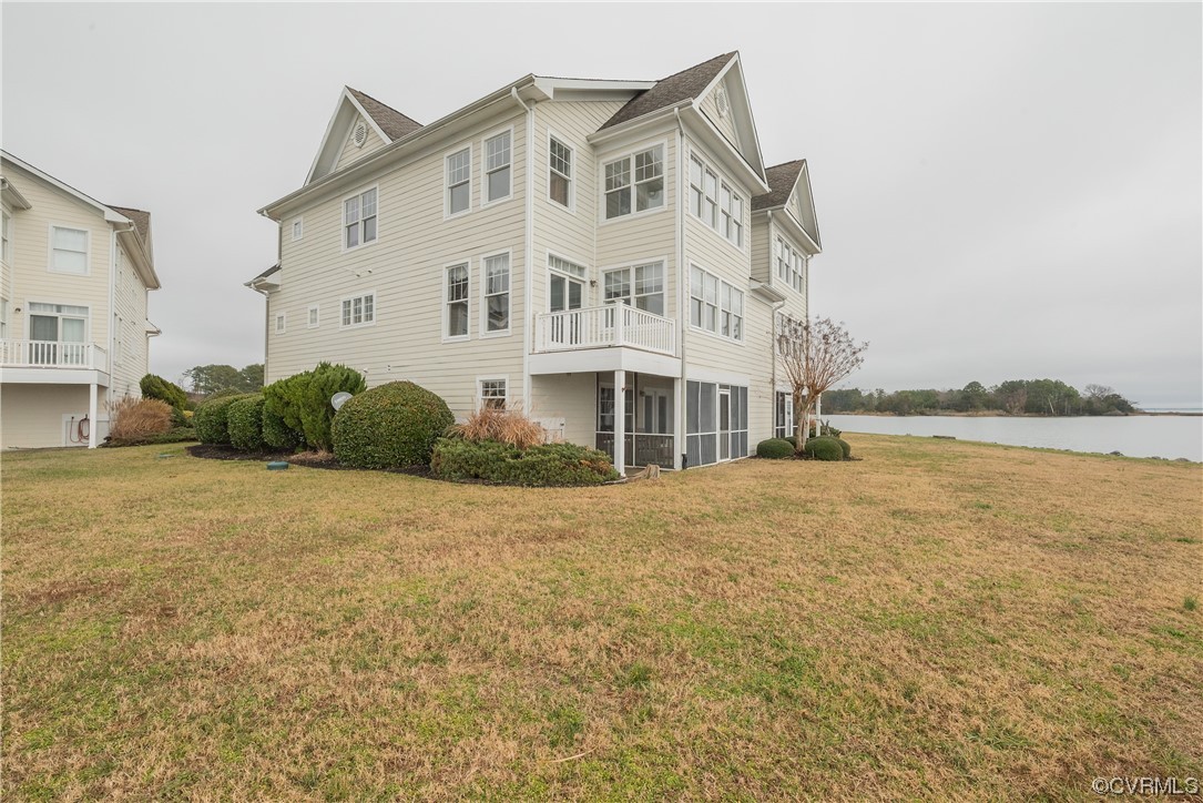 580 Riverside Drive Lancaster, VA 22503 - Photo 44 of 50 a front view of a house with a yard
