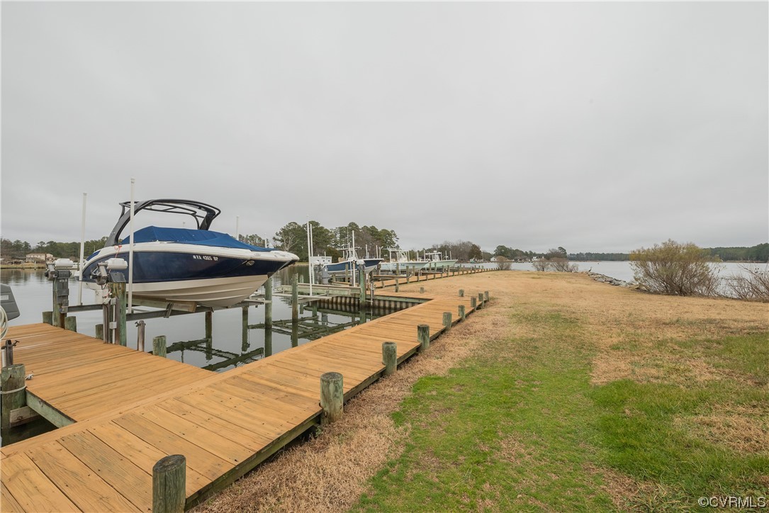 580 Riverside Drive Lancaster, VA 22503 - Photo 48 of 50 a view of a terrace with chairs