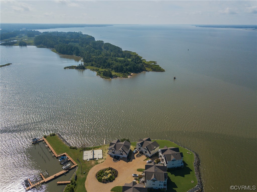 580 Riverside Drive Lancaster, VA 22503 - Photo 5 of 50 a view of storage and utility room with racks on the wall