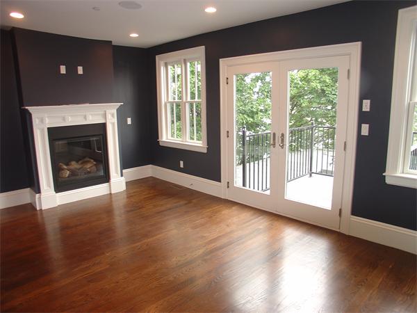 74 F Street, Unit 1 Boston, MA 02127 - Photo 11 of 17 a view of an empty room with wooden floor and a window