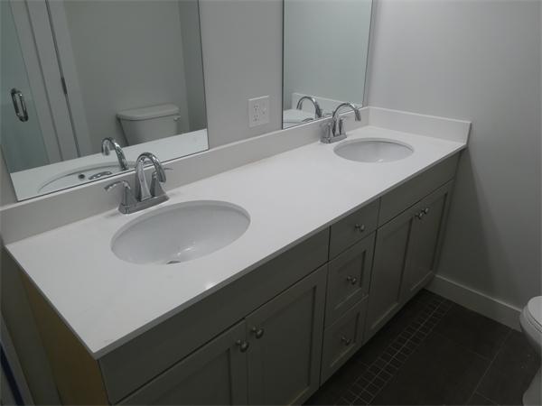 74 F Street, Unit 1 Boston, MA 02127 - Photo 4 of 17 a bathroom with a sink and a mirror