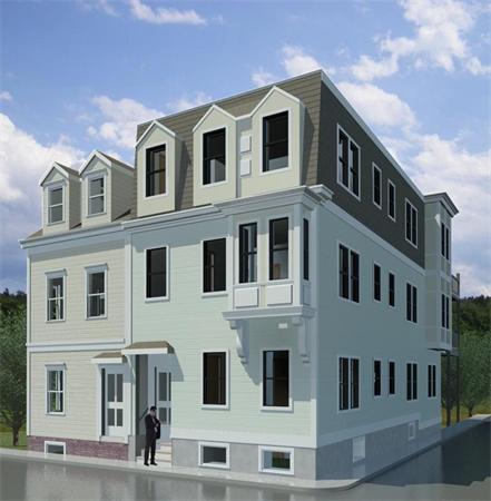 74 F Street, Unit 1 Boston, MA 02127 - Photo 8 of 17 a large building with a lot of windows