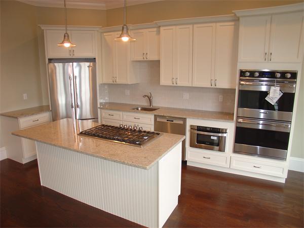 74 F Street, Unit 1 Boston, MA 02127 - Photo 10 of 17 a kitchen with granite countertop a stove and a sink