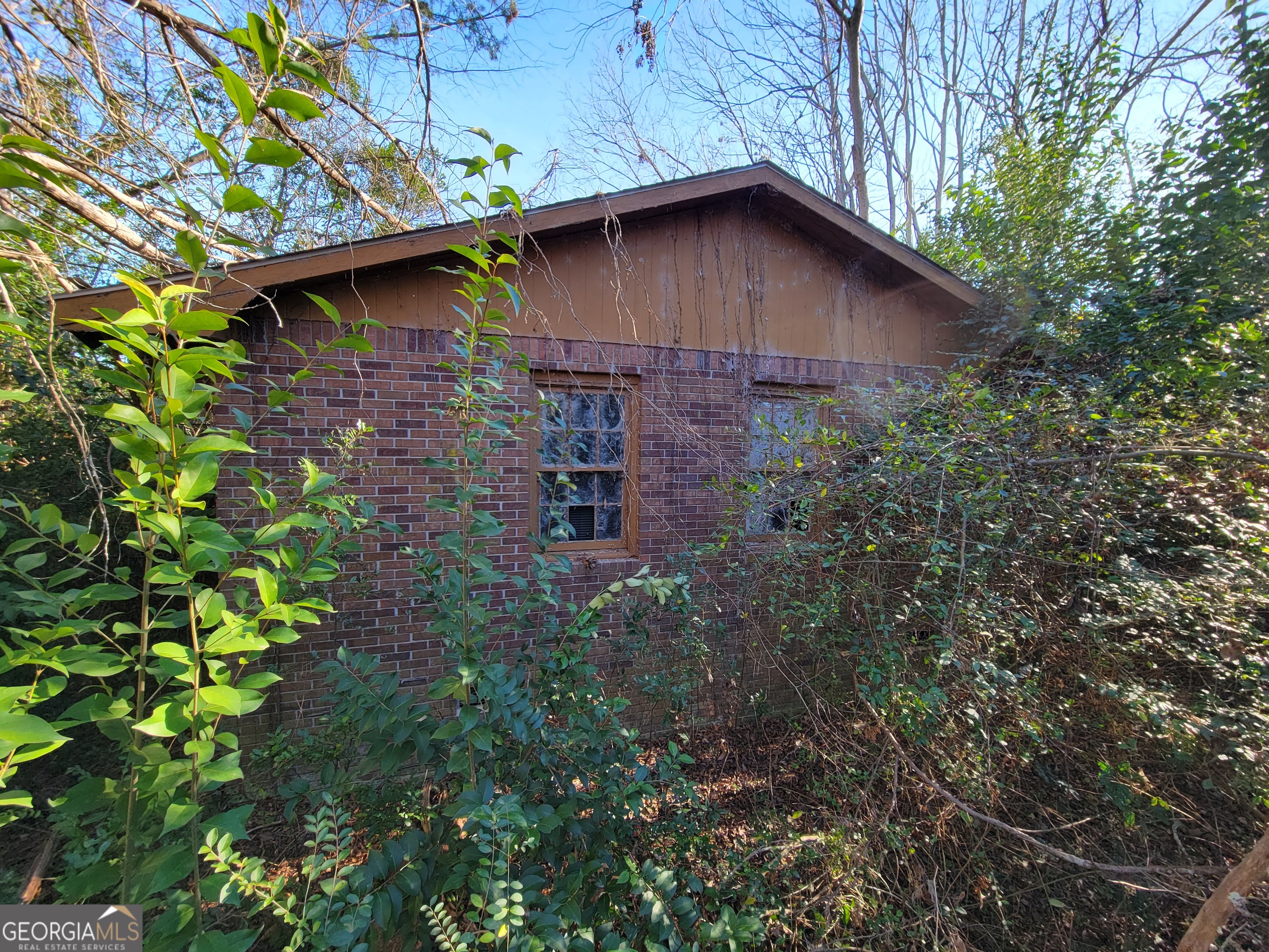 11 Zanders Avenue McRae-Helena, GA 31055 - Photo 6 of 15 a close view of a house with a yard