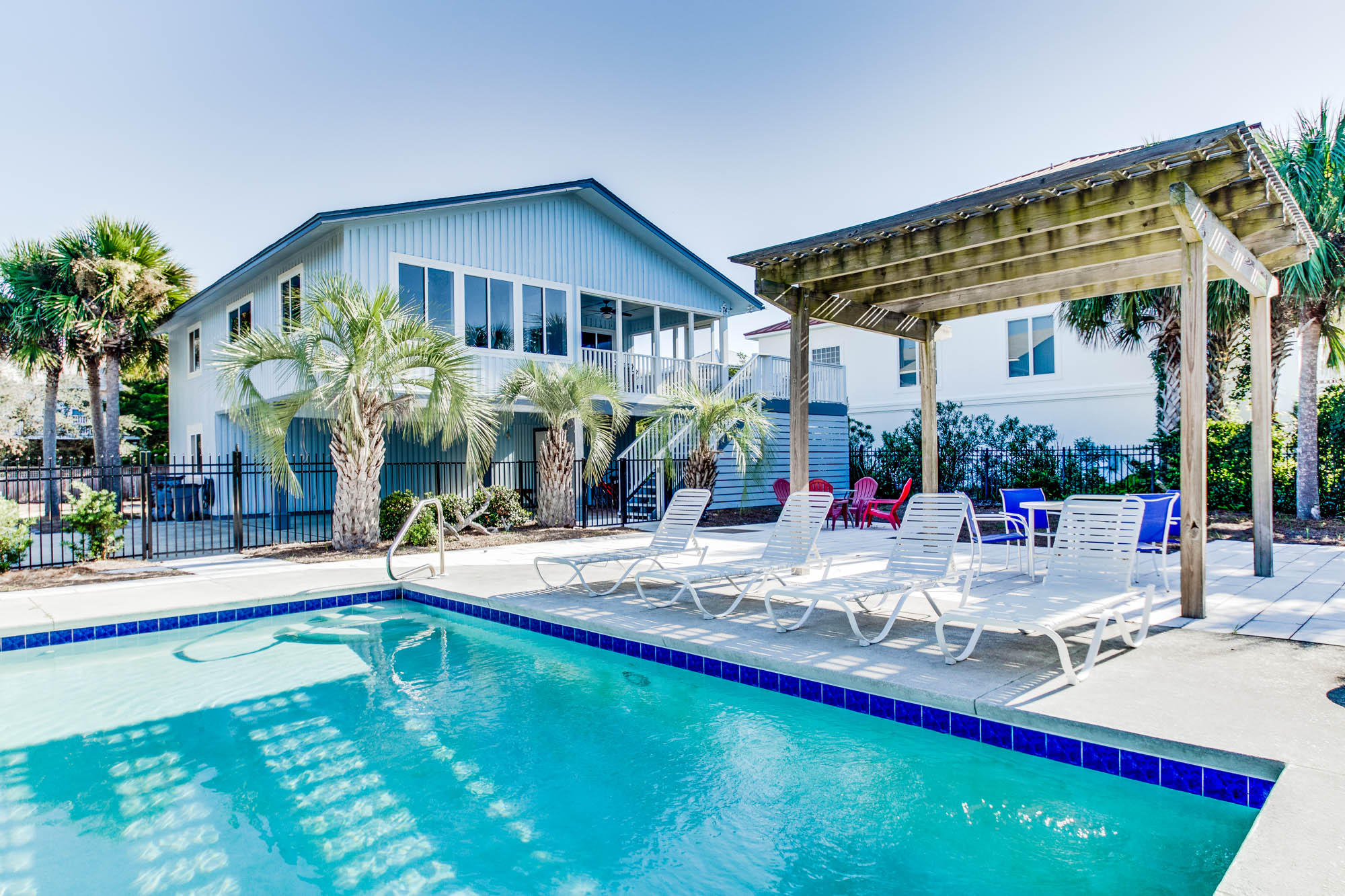 74 Pompano Street Inlet Beach, FL 32461 - Photo 1 of 46 a view of a house with swimming pool and sitting area