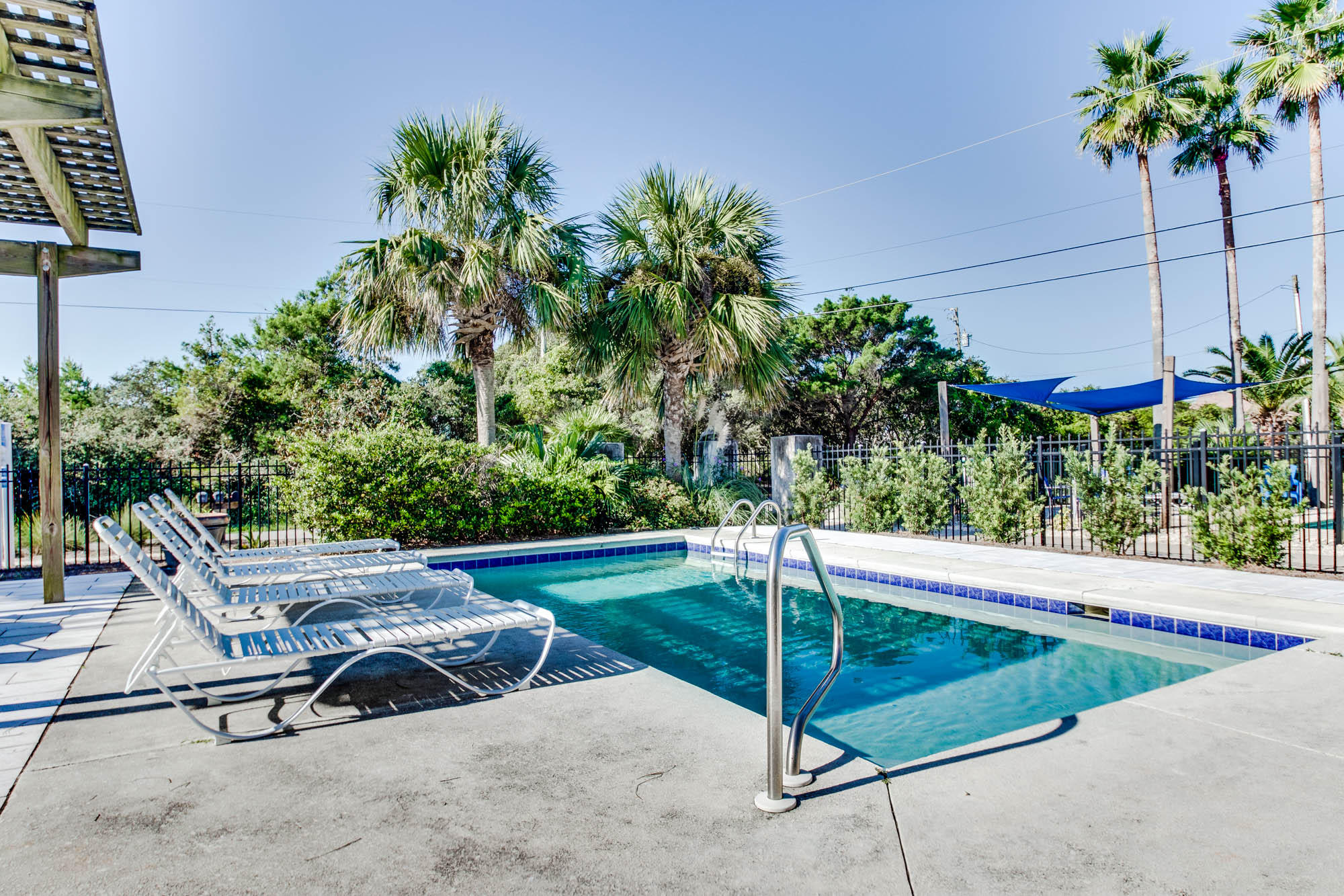 74 Pompano Street Inlet Beach, FL 32461 - Photo 25 of 46 a view of a backyard with plants and a slide