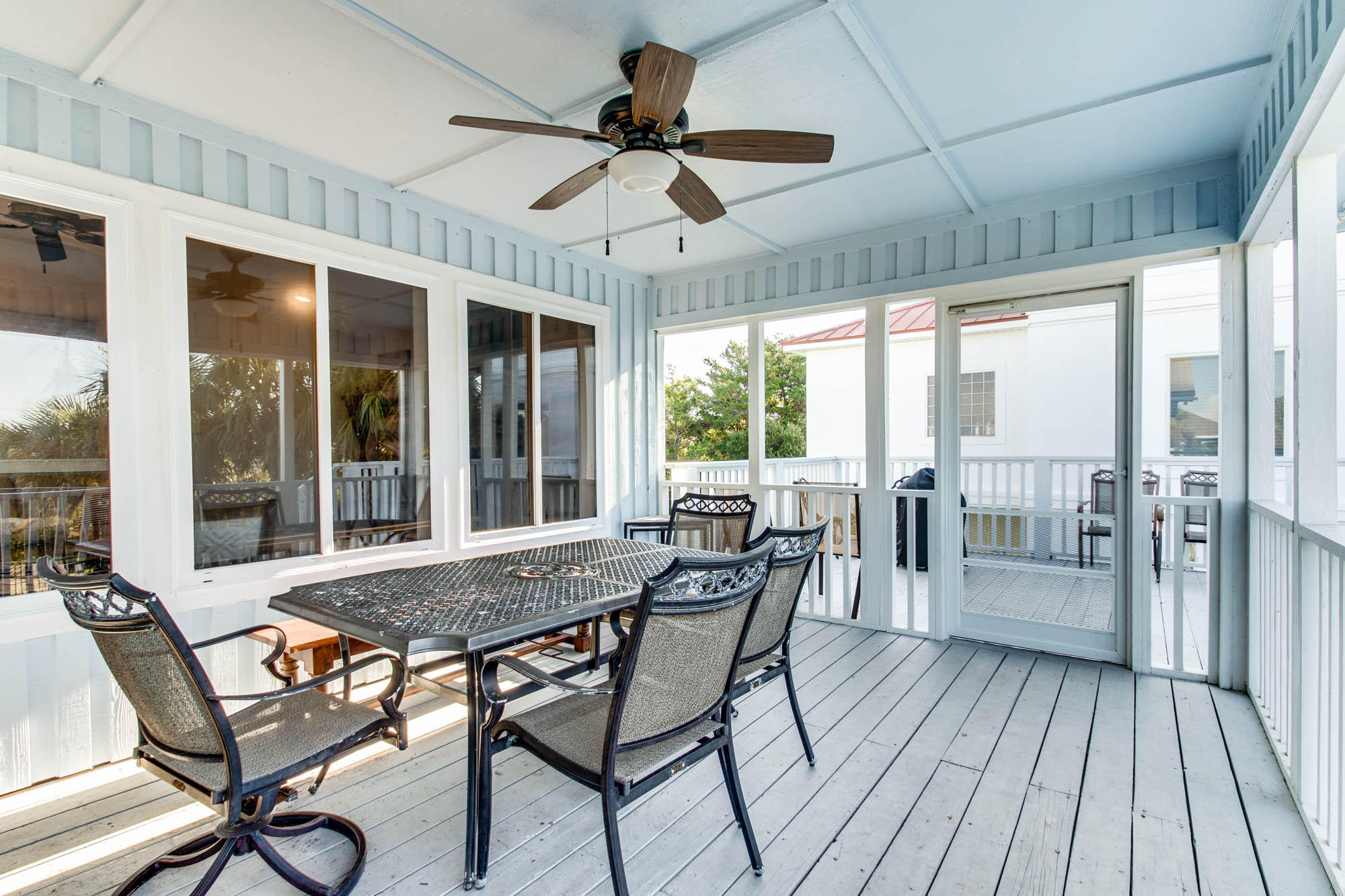 74 Pompano Street Inlet Beach, FL 32461 - Photo 28 of 46 a view of a dining room with furniture window and wooden floor