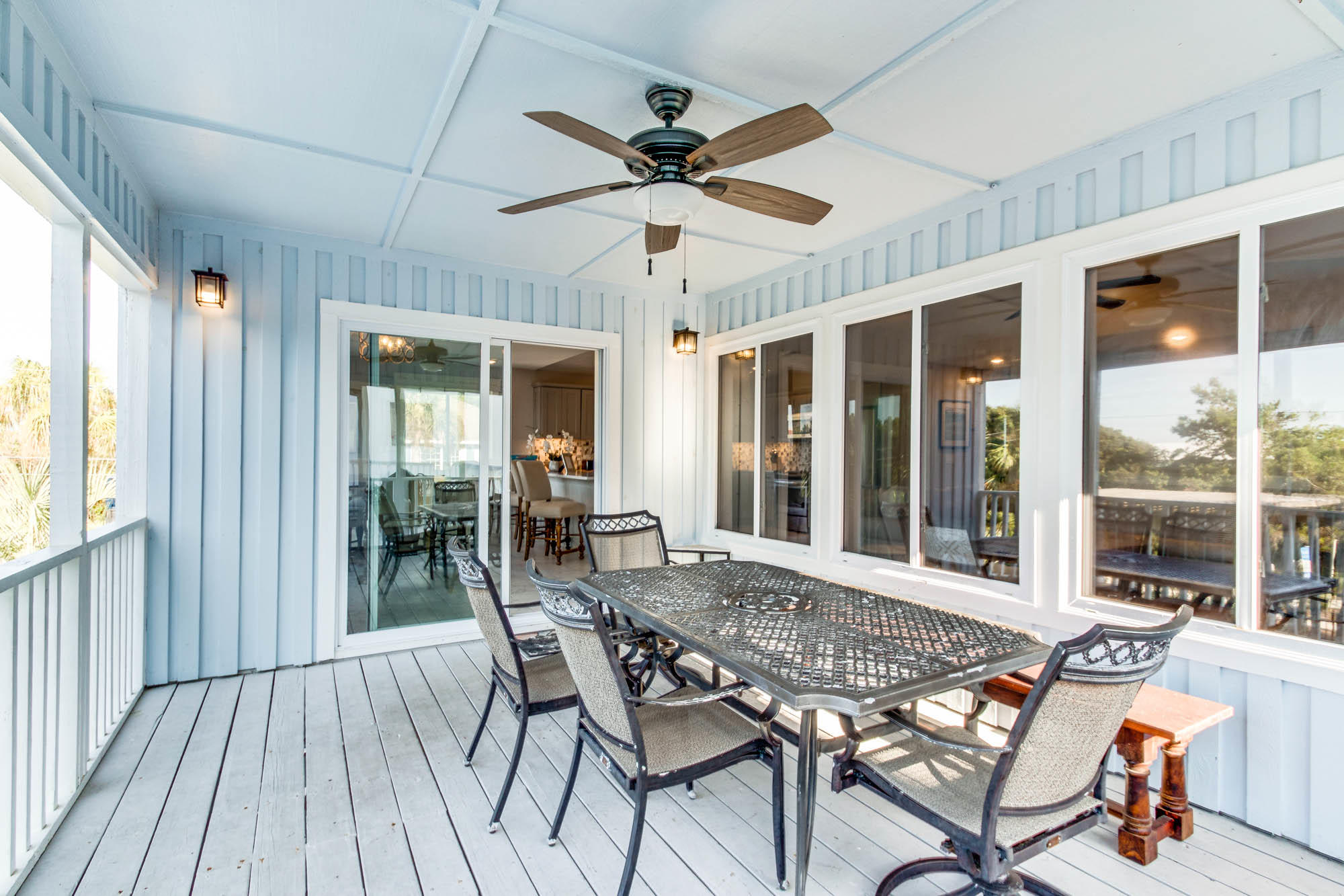 74 Pompano Street Inlet Beach, FL 32461 - Photo 29 of 46 a view of a patio with a table and chairs