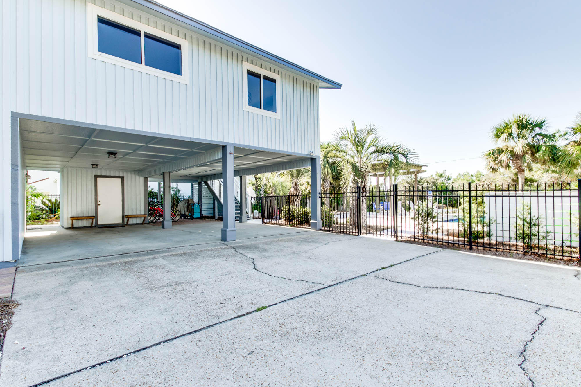 74 Pompano Street Inlet Beach, FL 32461 - Photo 39 of 46 a view of a house with porch and garden