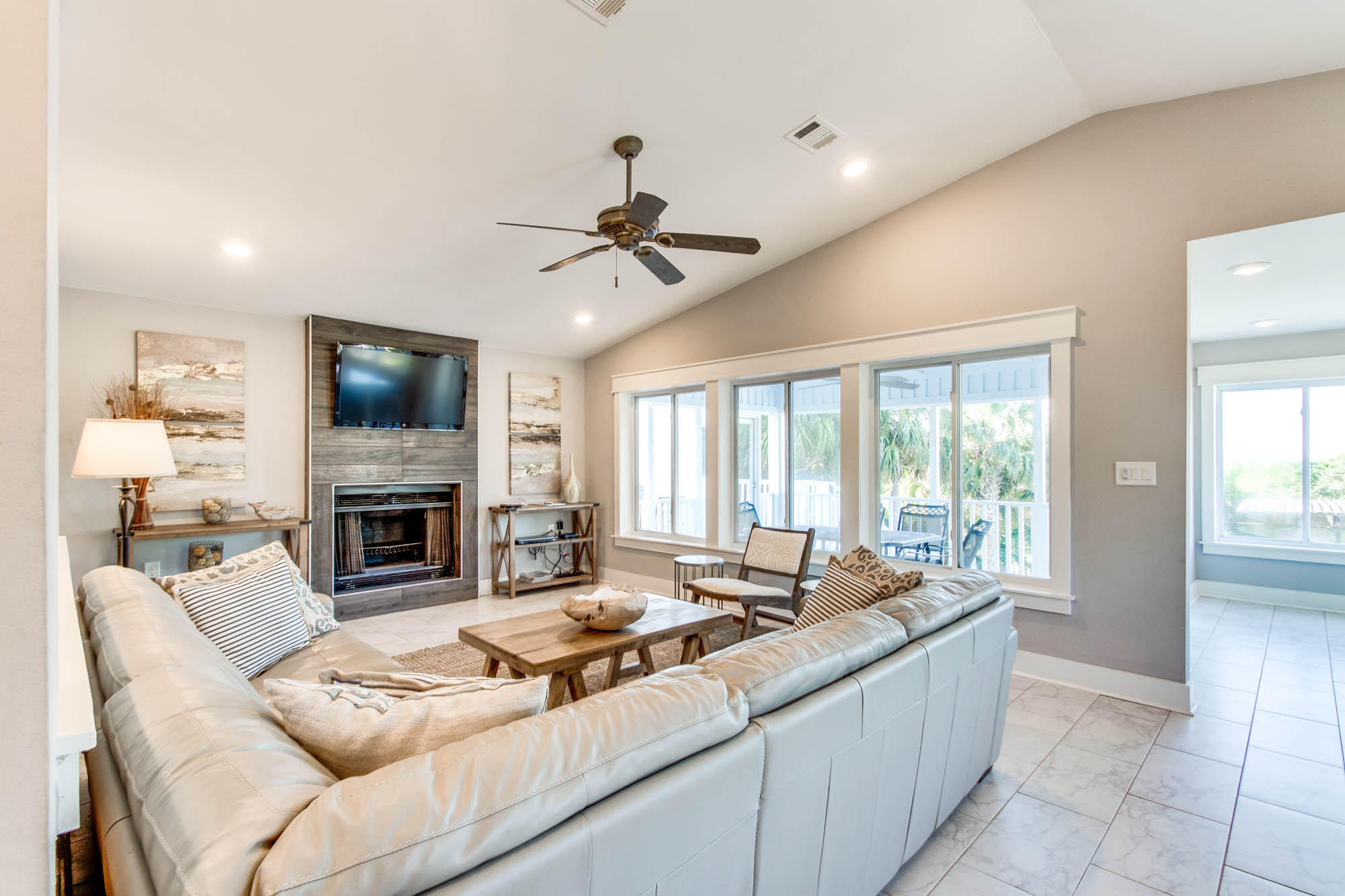 74 Pompano Street Inlet Beach, FL 32461 - Photo 8 of 46 a living room with furniture a fireplace and a flat screen tv