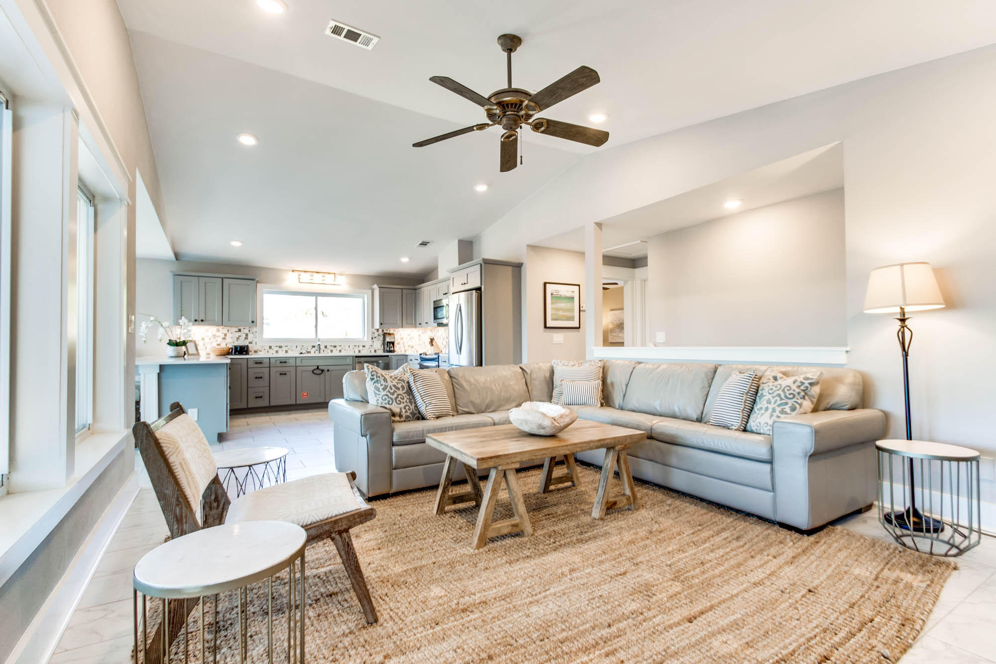 74 Pompano Street Inlet Beach, FL 32461 - Photo 9 of 46 a living room with furniture kitchen view and a wooden floor