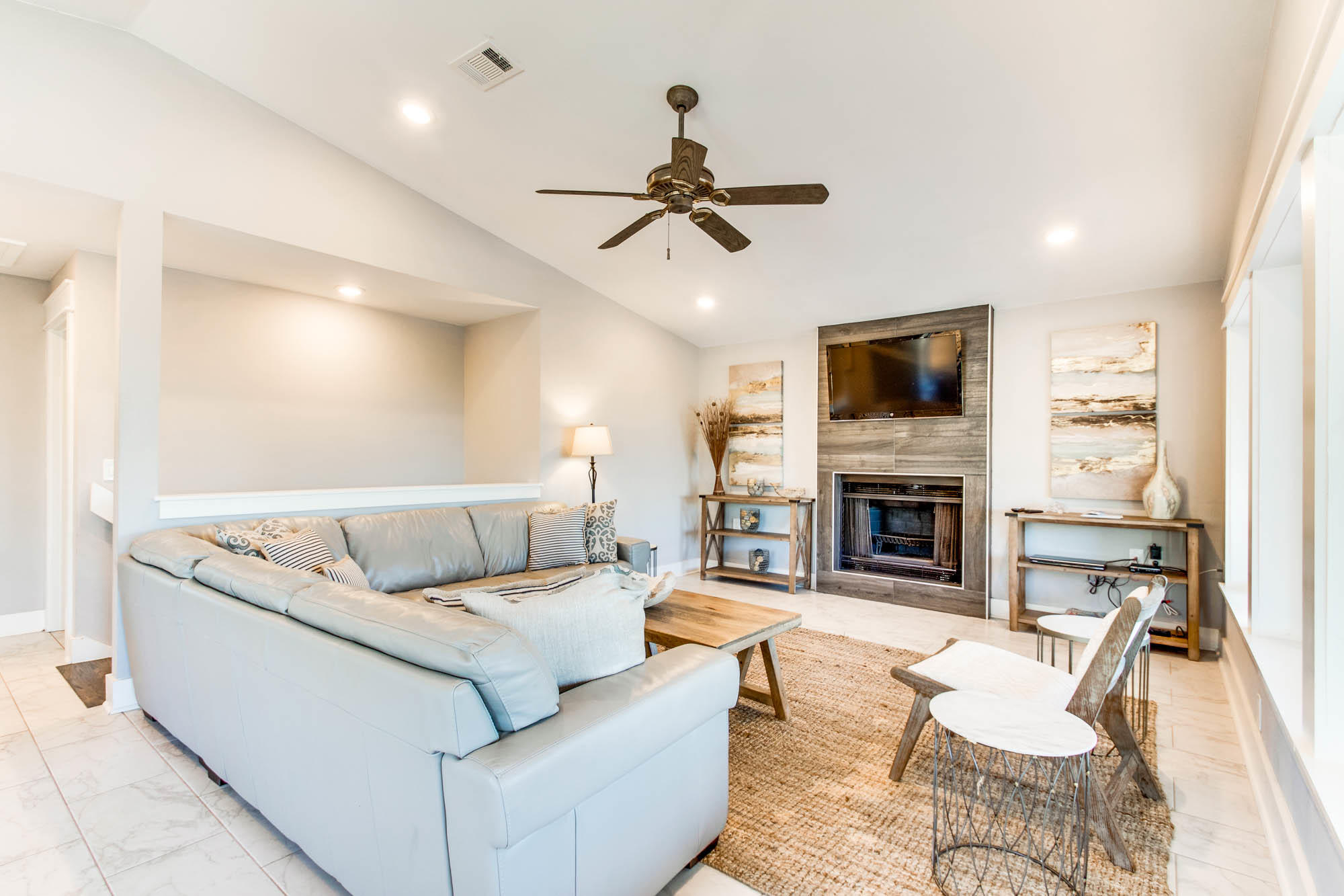 74 Pompano Street Inlet Beach, FL 32461 - Photo 10 of 46 a living room with furniture fireplace and a flat screen tv