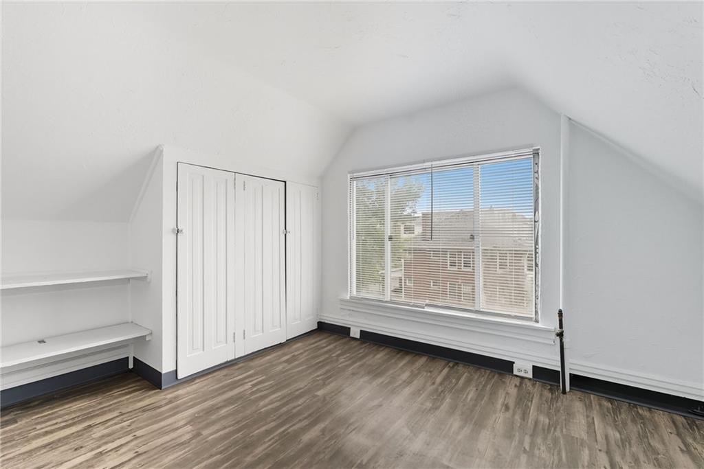 705 Russellwood Avenue McKees Rocks, PA 15136 - Photo 18 of 37 a view of wooden floor and windows in a room