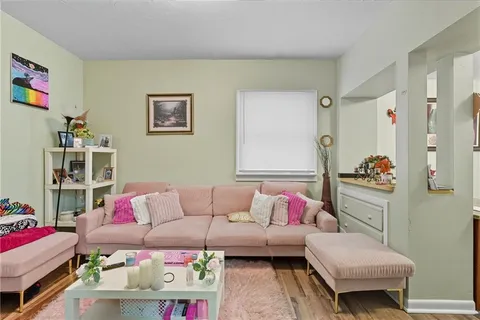 a living room with furniture and a couch