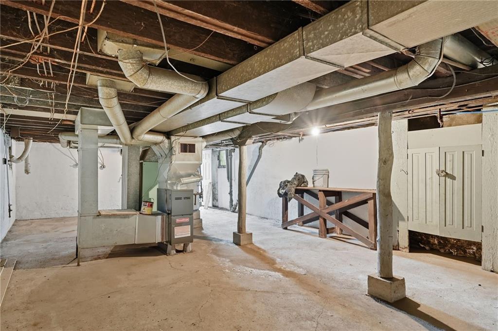 705 Russellwood Avenue McKees Rocks, PA 15136 - Photo 33 of 37 a view of an empty room with wooden floor