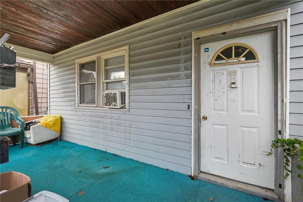 705 Russellwood Avenue McKees Rocks, PA 15136 - Photo 4 of 37 a front view of a house with garden