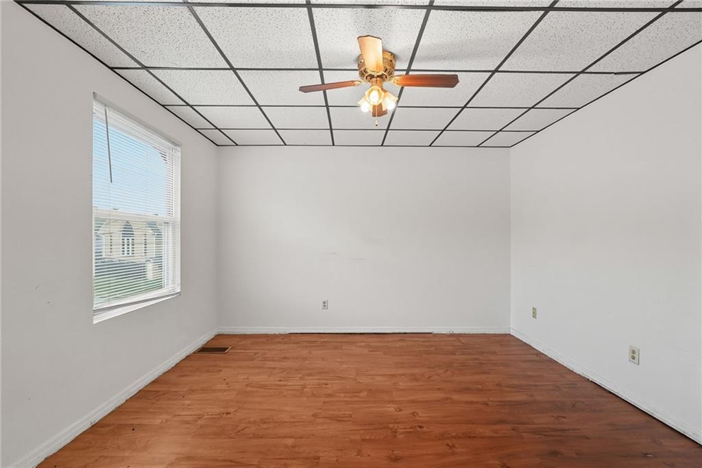 705 Russellwood Avenue McKees Rocks, PA 15136 - Photo 6 of 37 a view of a room with wooden floor