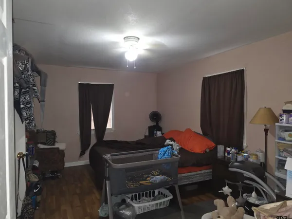 a room with furniture and wooden floor