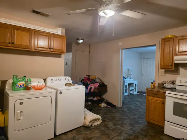 a storage room with washer and dryer
