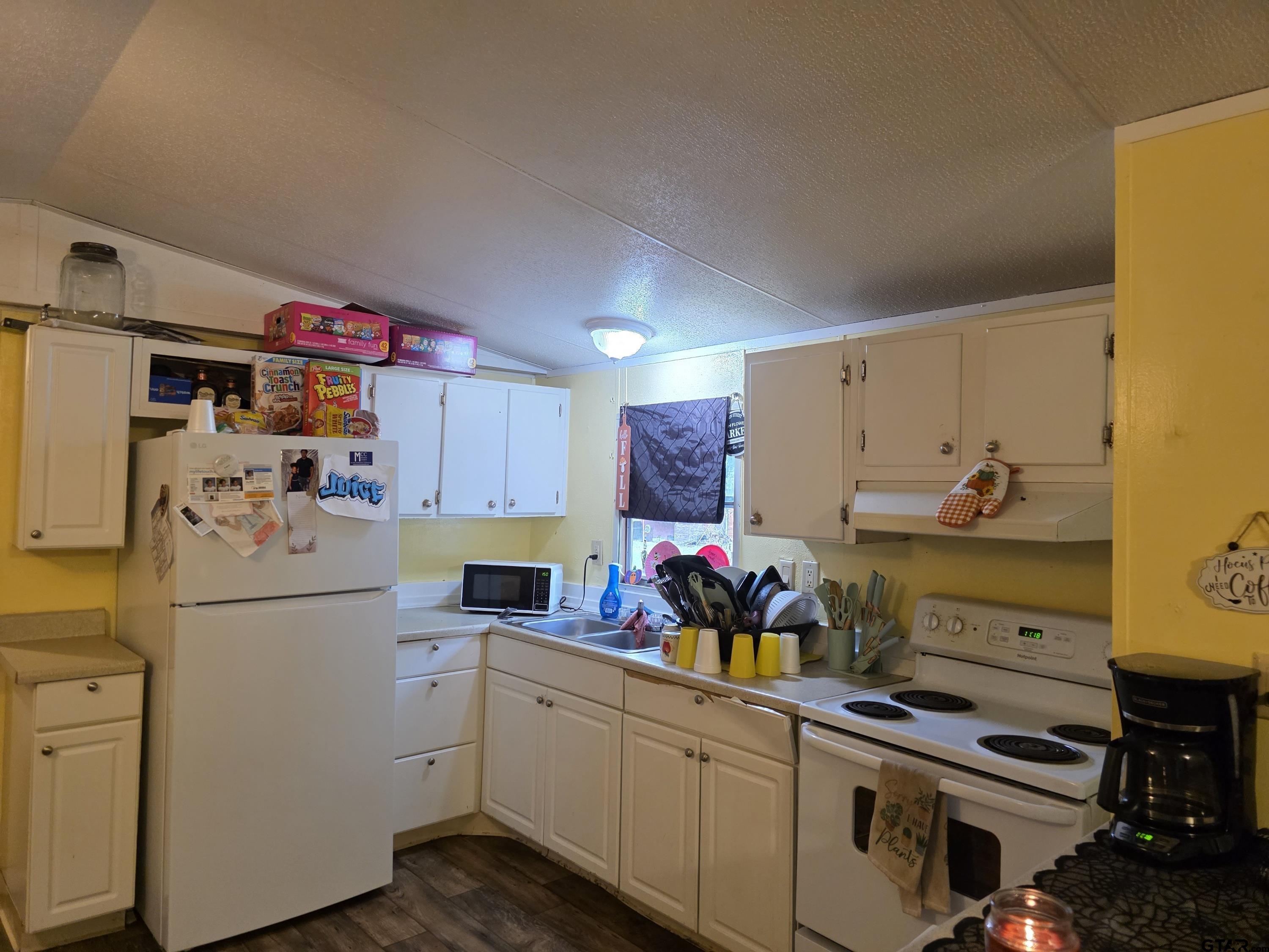 304 Walnut Street Naples, TX 75568 - Photo 6 of 28 a room with storage and utility