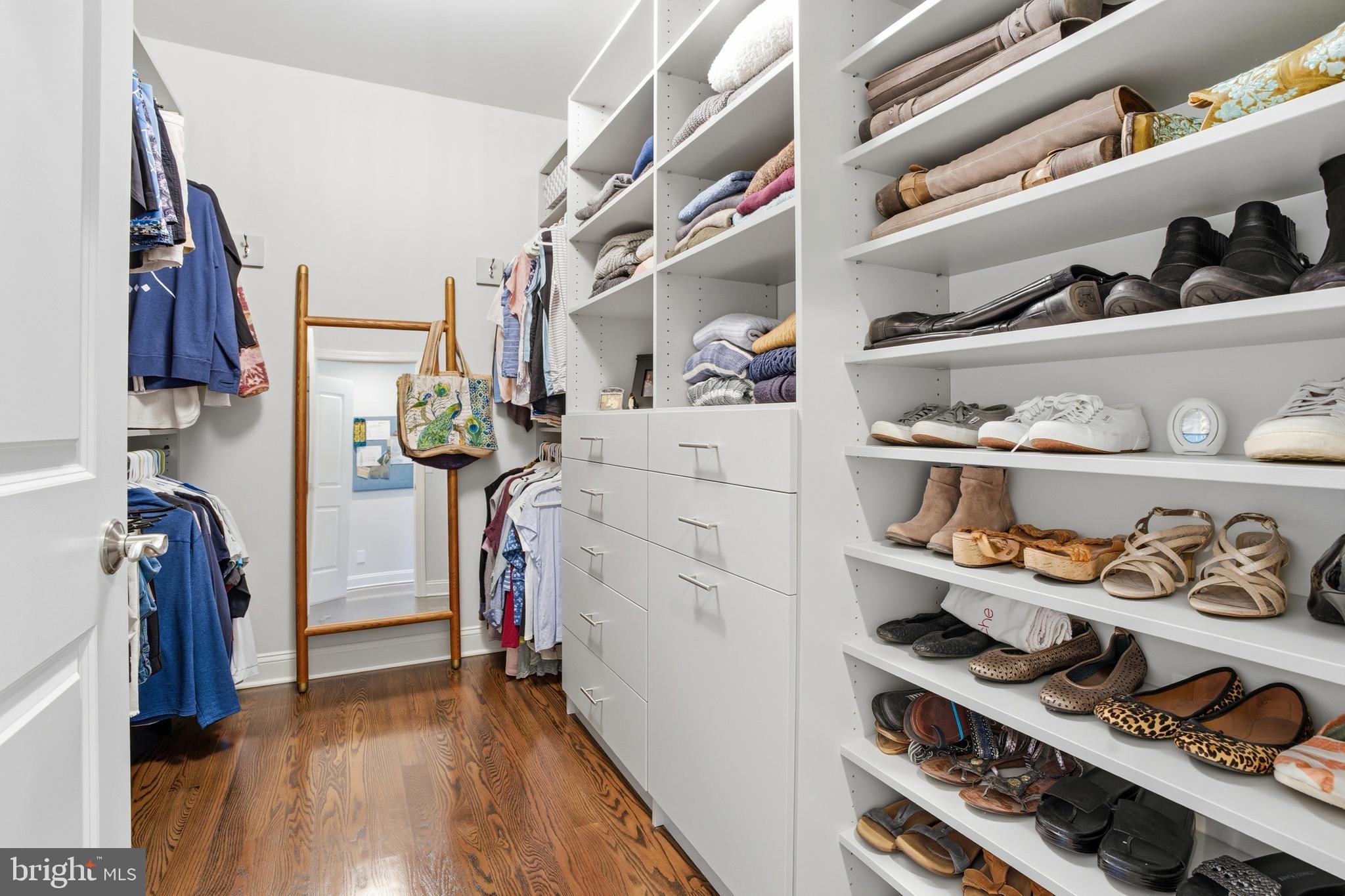 2401 Lower State Road, Unit 106 Doylestown, PA 18901 - Photo 19 of 56 a view of walk in closet with clothes and shoes