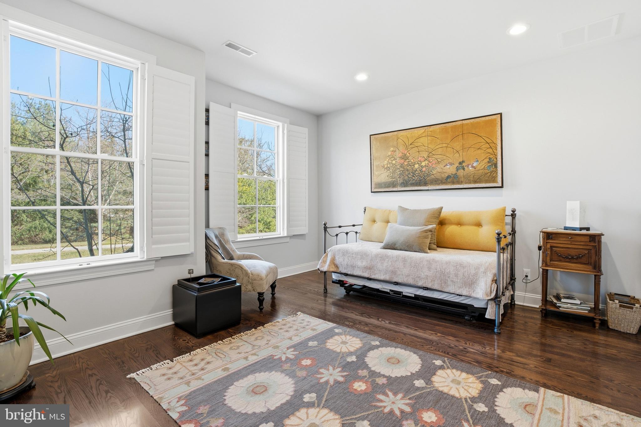 2401 Lower State Road, Unit 106 Doylestown, PA 18901 - Photo 21 of 56 a spacious bedroom with a bed and a couch