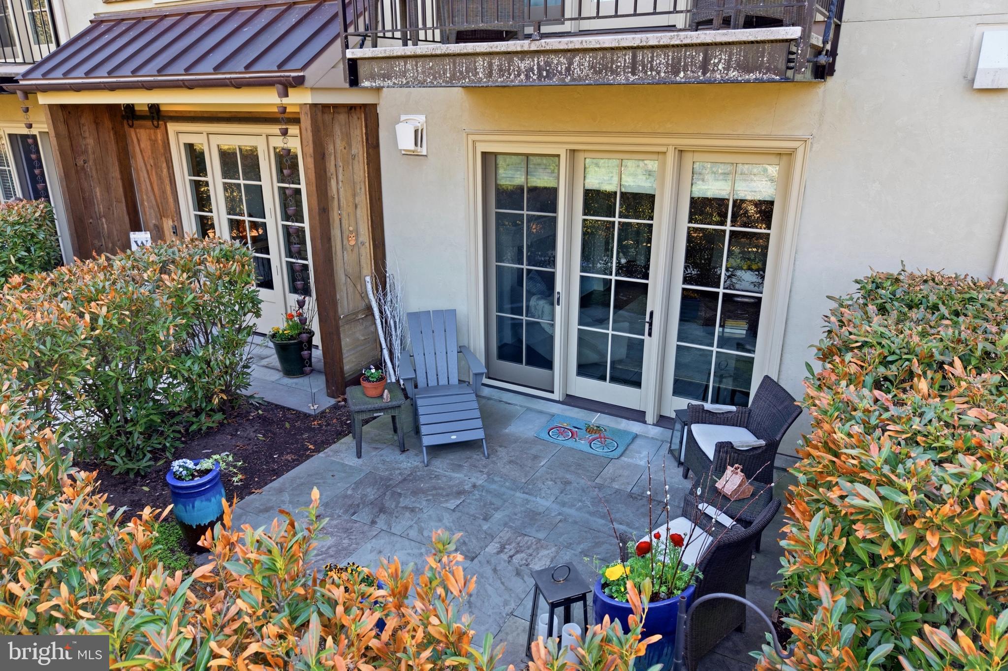 2401 Lower State Road, Unit 106 Doylestown, PA 18901 - Photo 53 of 56 a front view of a house with a yard