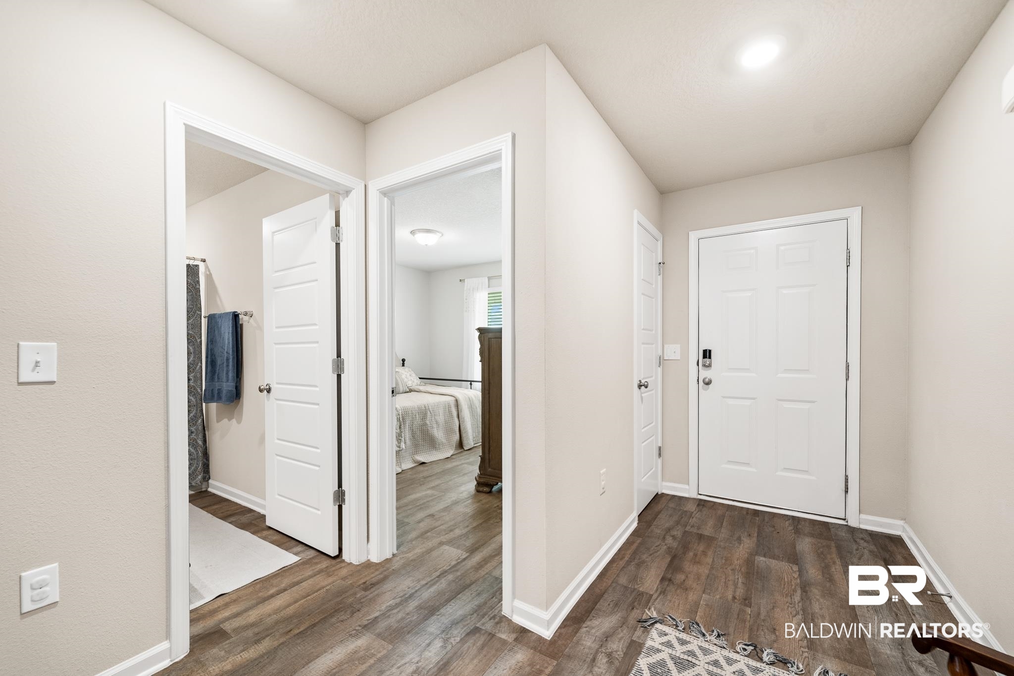 10516 Brodick Loop Daphne, AL 36527 - Photo 12 of 27 Foyer entrance with dark hardwood / wood-style flooring